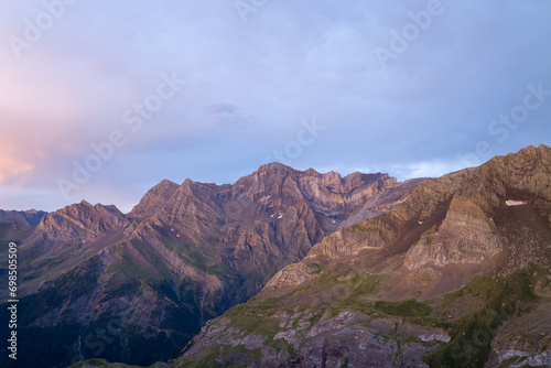 The barren rocky mountains in the middle of the countryside , Europe, France, Occitanie, Hautes-Pyrenees, in summer on a sunny day. © Florent
