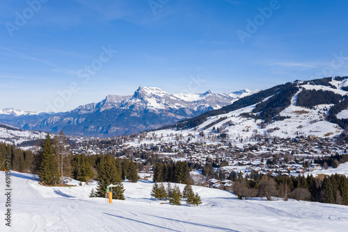 Aup de Veran, Tete du Colonney, Aiguille Rouge and Varan in Megeve in Europe, France, Rhone Alpes, Savoie, Alps, in winter on a sunny day. photo