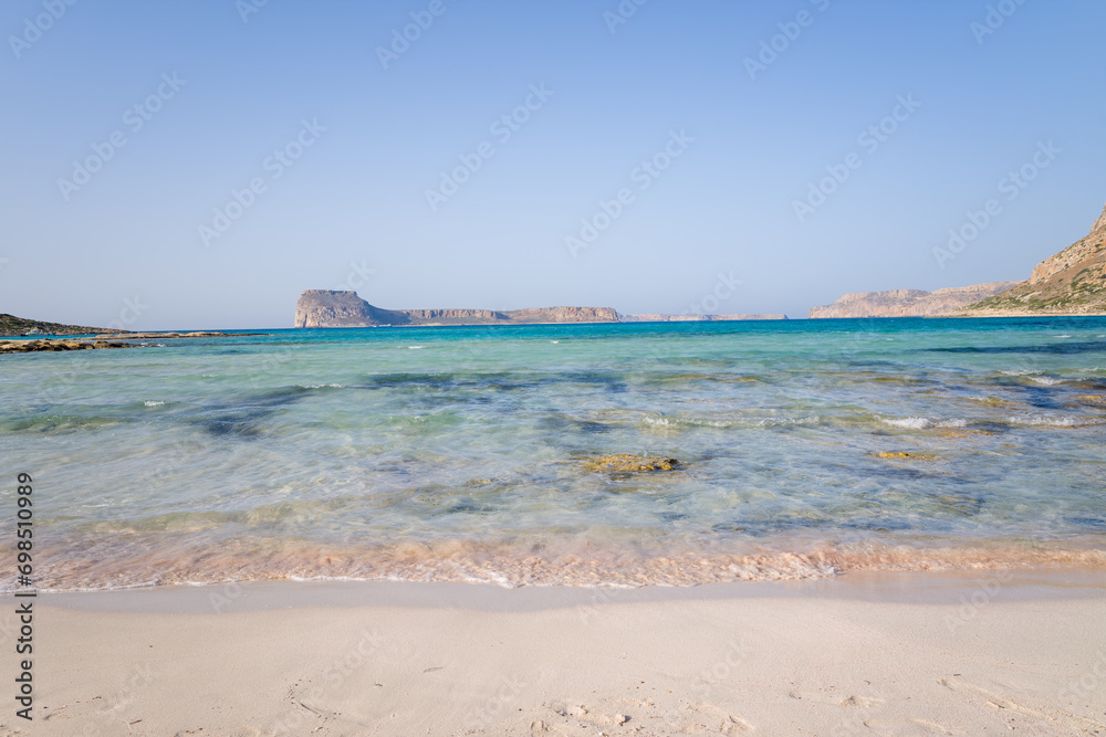 The Venetian castle on its arid rock , in Europe, Greece, Crete, Balos, By the Mediterranean sea, in summer, on a sunny day. The Venetian castle on its arid rock , in Europe, Greece, Crete, Balos, By the Mediterranean sea, in summer, on a sunny day.