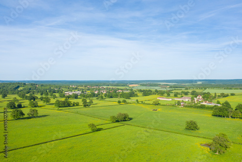 A French village in the green countryside in Europe  France  Burgundy  Nievre  Cuncy les Varzy  towards Clamecy  in Spring  on a sunny day.