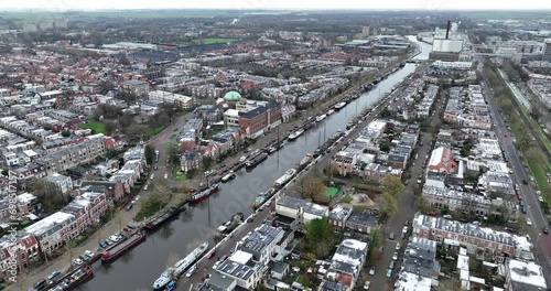 Dutch city of Leeuwarden in Friesland, The Netherlands. Aerial drone view of the canals and urban housing. photo