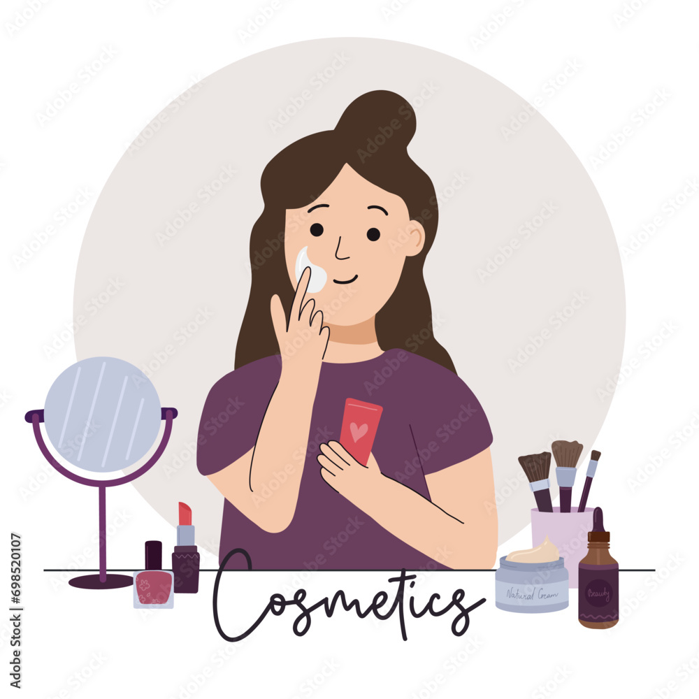 Woman applies a cream to her face. Cosmetics, skincare, makeup concept Woman applies a cream to her face. Cosmetics, skincare, makeup concept