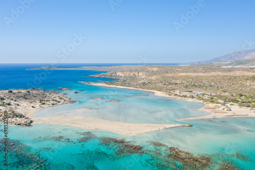 The sandy beach and its heavenly colored water, in Europe, Greece, Crete, Elafonisi, By the Mediterranean Sea, in summer, on a sunny day. © Florent