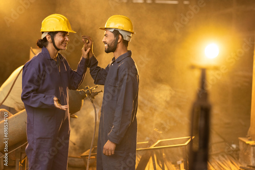 Photography Two factory worker having fun while launch break at workshop
