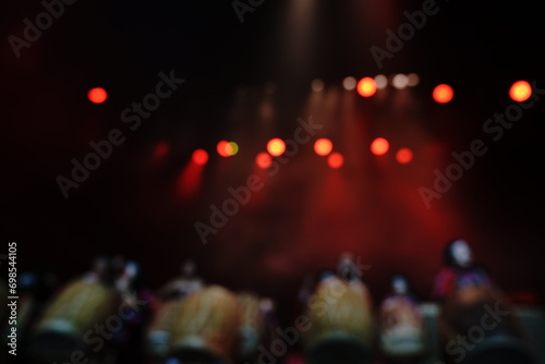 Defocused entertainment concert lighting on stage, blurred disco party and Concert Live.