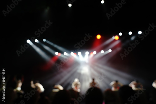 Defocused entertainment concert lighting on stage, blurred disco party and Concert Live. © Leo Li
