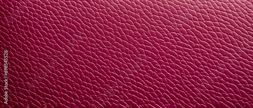 Red, bordeaux, pink leather fine, luxury structure for elegant background. Smooth detailed textured of lavish, luxurious magenta leather. Animal skin surface.