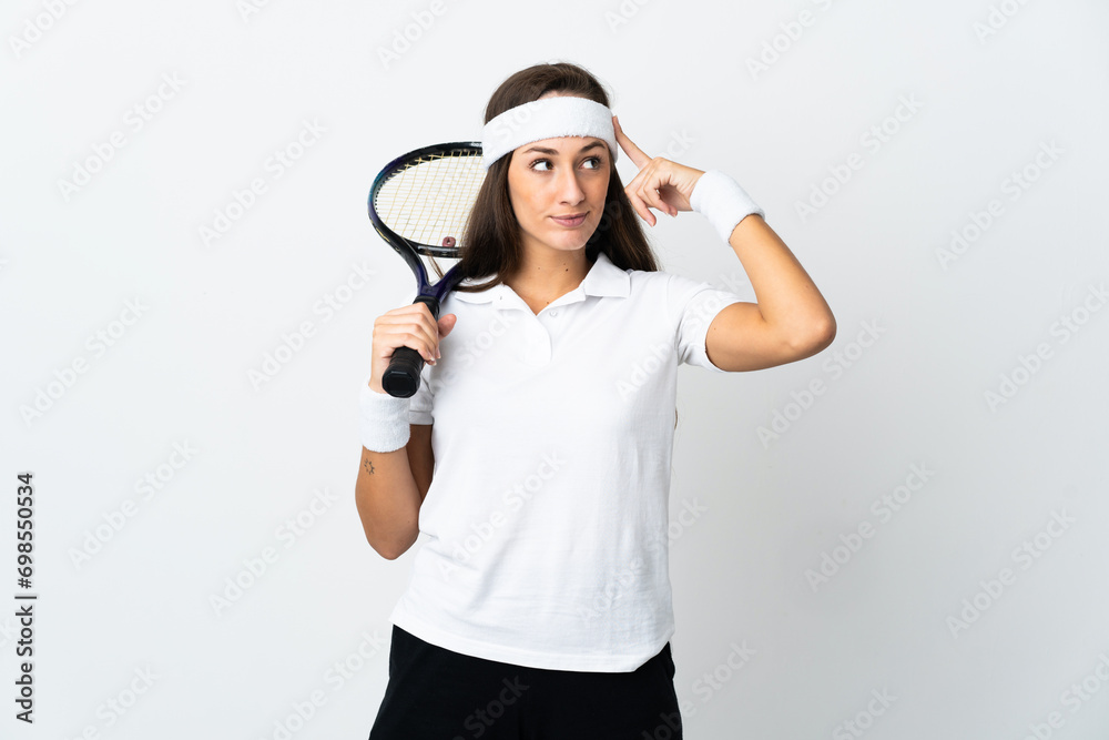 Young woman tennis player over isolated white background having doubts and thinking Young woman tennis player over isolated white background having doubts and thinking