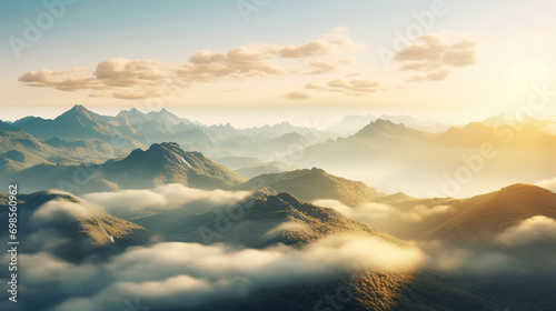 A landscape with mountains in the clouds