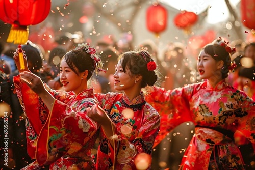 Group of Asian women in traditional costume celebrating Chinese Lunar New Year. People in traditional costumes at the Lunar New Year Fair, Luannan County, Hebei Province, China photo
