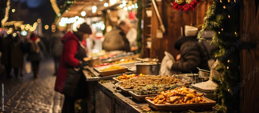 Polish street food stall in Main Square, Krakow during Christmas market. - obrazy, fototapety, plakaty 