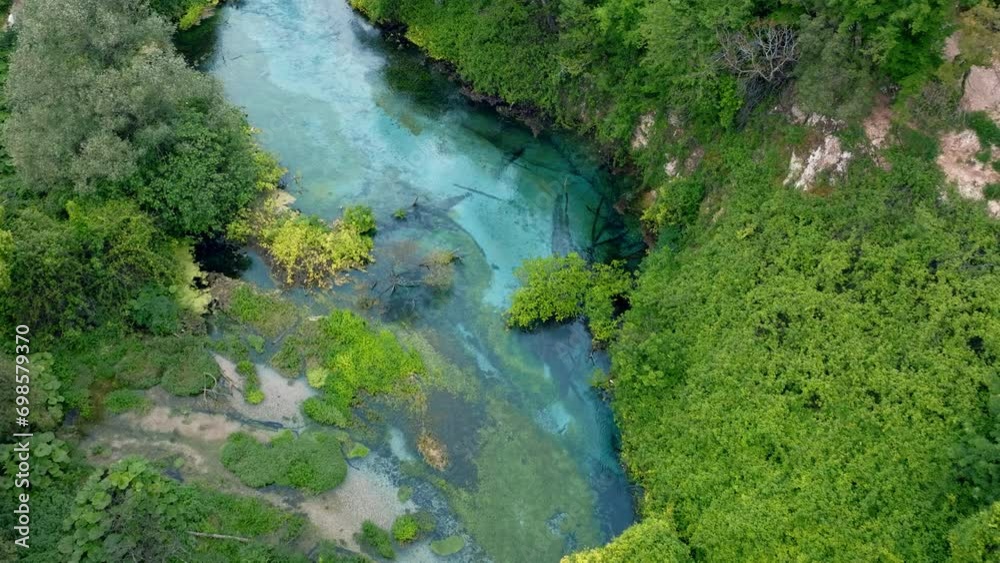 Aerial rising over Blue eye spring a natural phenomenon in Albania Aerial rising over Blue eye spring a natural phenomenon in Albania