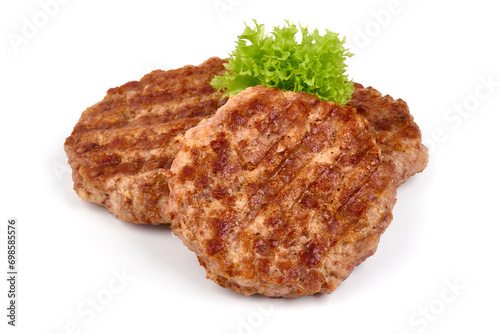 Roasted patties with spices, isolated on white background.