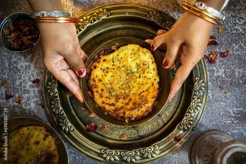 Traditional Indian Dessert Mithai Malpua, Malpooa Or Maalpua  is Juicy Sugary Pancakes Sweets Also Called Drenched, Dunked, Soaked Or Dip In Sugar Syrup Cheeni Ki Chasni. photo