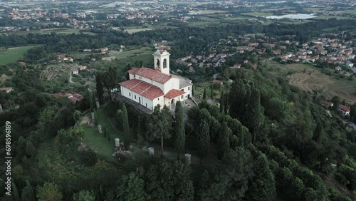 Aerial orbit around cathedral in Montevecchia, Italy named 