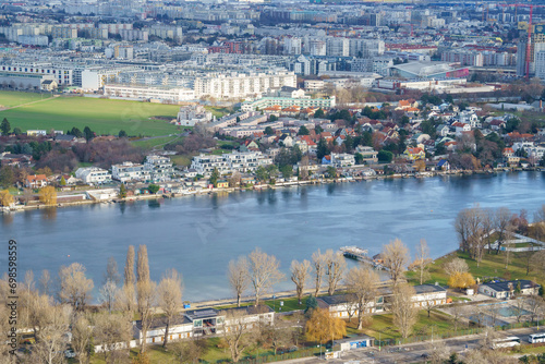 Old Danube waterfront with numerous piers and recreational areas - a long and large recreational lake of 1.6 square kilometers completely separated from the Danube River