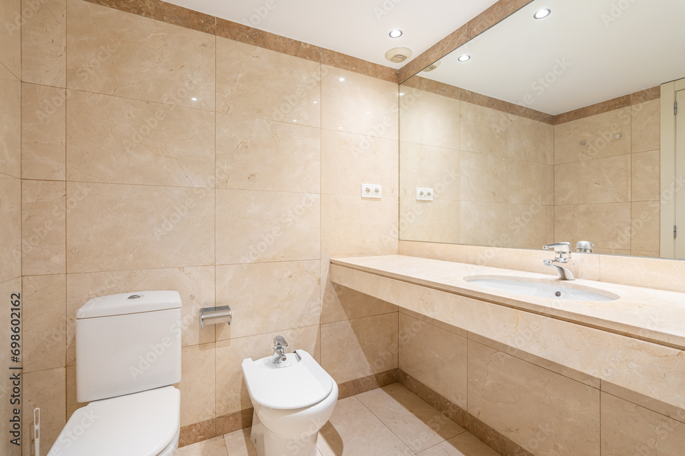 Toilet bidet and long unit with sink and large mirror Toilet bidet and long unit with sink and large mirror