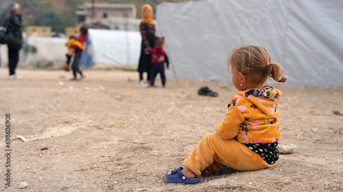 World Refugee Day. Syrian refugee children suffer from tragic humanitarian conditions in winter. 