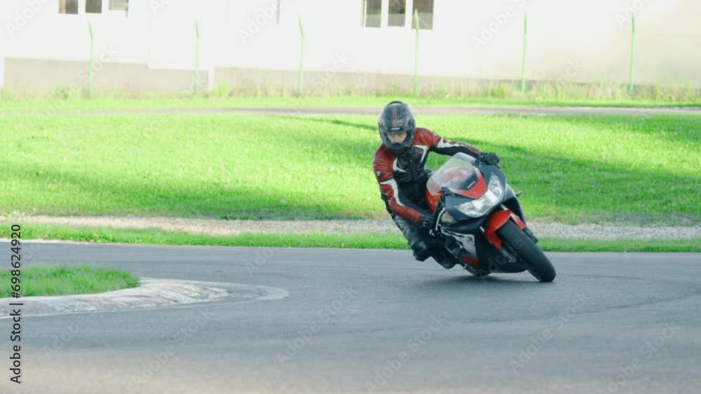 Male person move motorbike. Rider man drive motorcycle. Extreme sports motorcycle driver on the track. Moto trip slow motion Male person move motorbike. Rider man drive motorcycle. Extreme sports motorcycle driver on the track. Moto trip slow motion