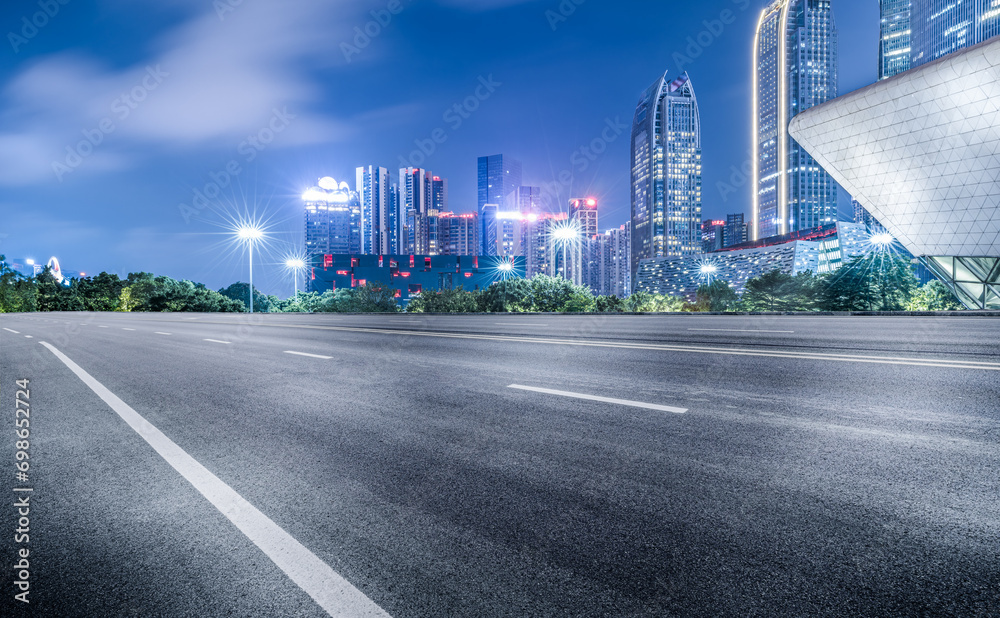 Asphalt road with city buildings skyline in Guangzhou