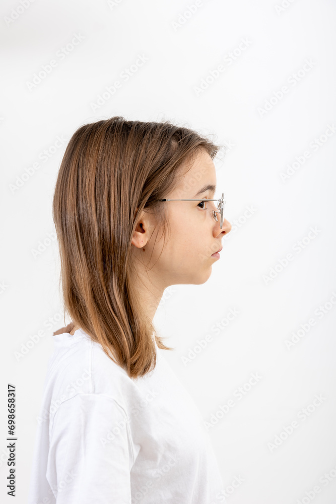 Side view portrait of girl with glasses, isolated on white background. Side view portrait of girl with glasses, isolated on white background.