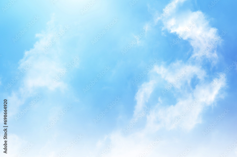 Obraz premium Blue sky with white cloud. The summer heaven is colorful clearing day Good weather and beautiful nature in the morning.