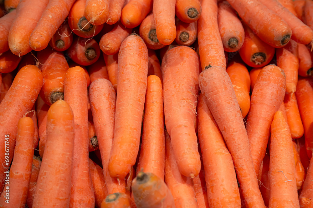 A group of carrot vegetables for sale at the supermarket. A group of carrot vegetables for sale at the supermarket.