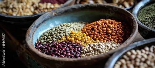 Assorted grains and legumes in a bowl. photo