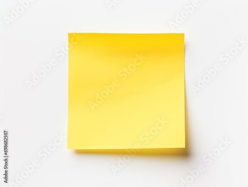 Closeup yellow sheets for sticky notes on white background