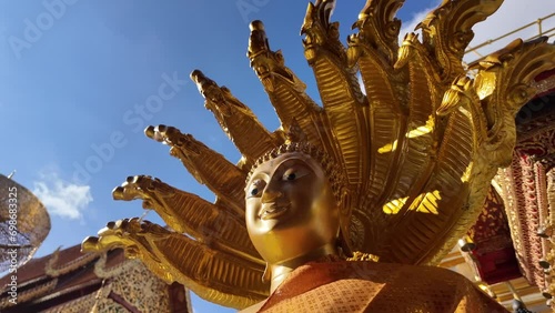 Amazing slow motion of a Buddhist guardian statue.	 photo