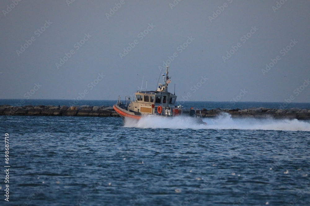 High speed pursuit by a coast guard vessel High speed pursuit by a coast guard vessel