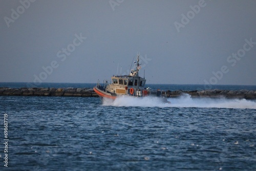 High speed pursuit by a coast guard vessel 