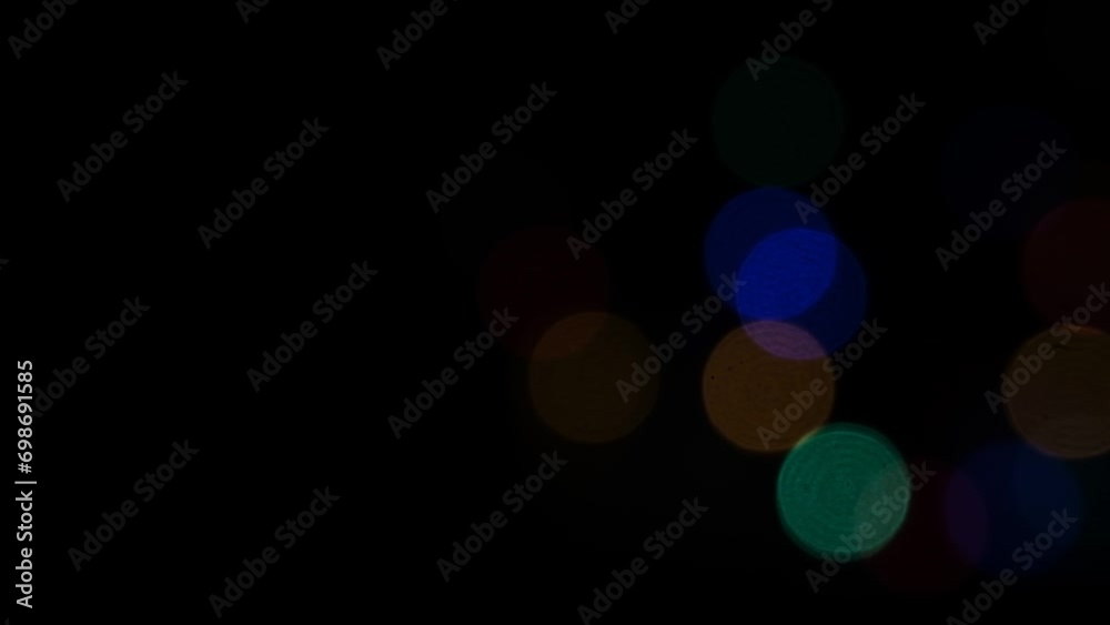 Christmas bokeh lights defocused background. Blurred fairy lights. Out of focus holiday background. Christmas bokeh lights defocused background. Blurred fairy lights. Out of focus holiday background.