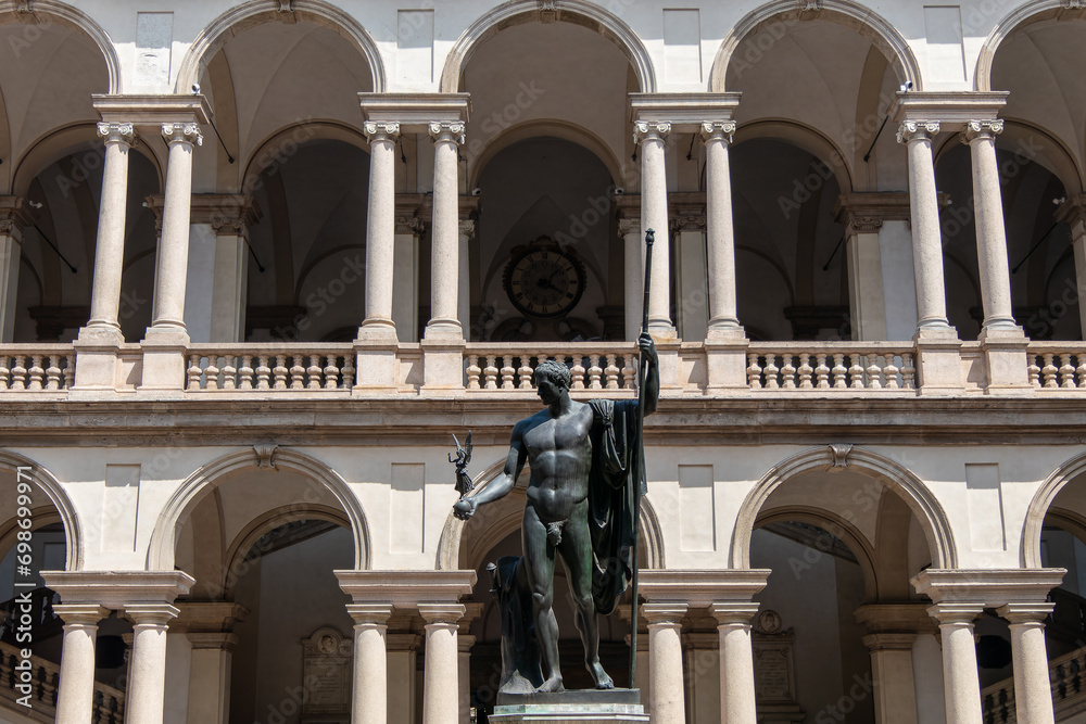 Milan, Italy, July 31, 2023. The bronze statue to Napoleon Bonaparte sculpted by Antonio Canova, in the courtyard of the Palace of Brera at Milan.