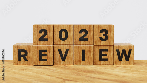 2023 Annual review, business and customer review. Learning, improvement, planning and development concept. 2023 Review on wooden cubes. 3d illustration