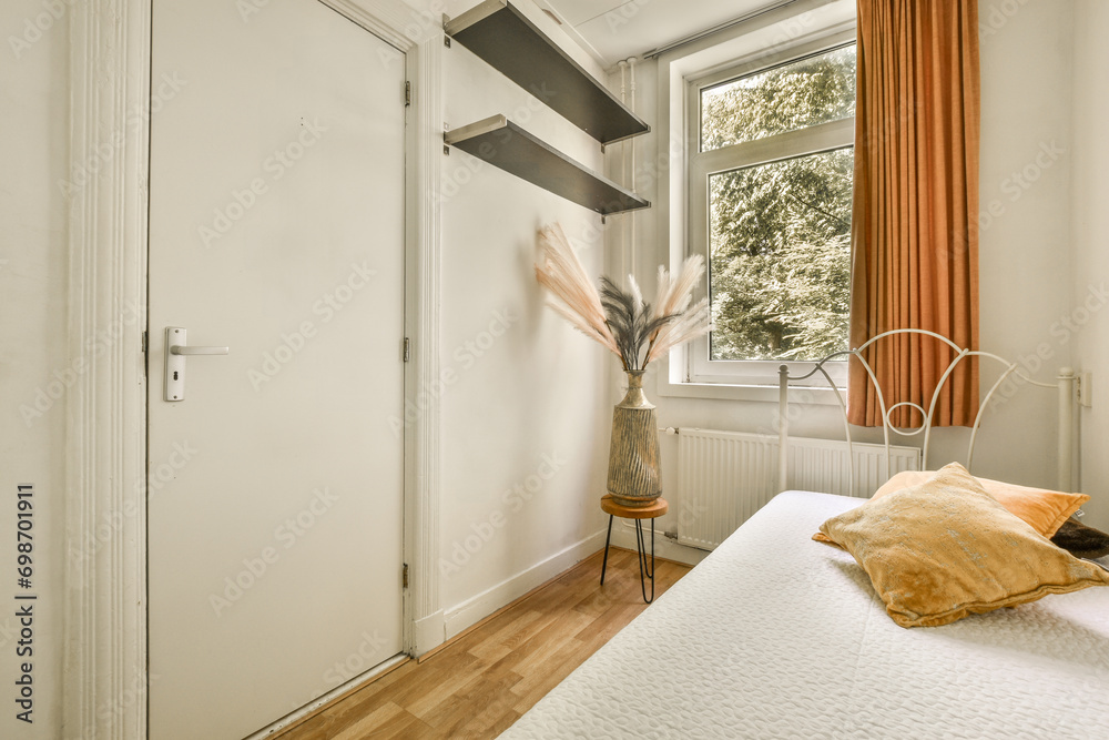 Bedroom with small bed and window Bedroom with small bed and window