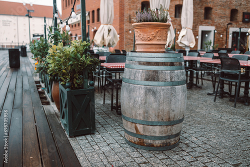 Traditional wooden barrel on street outdoors. Wine making. High quality photo