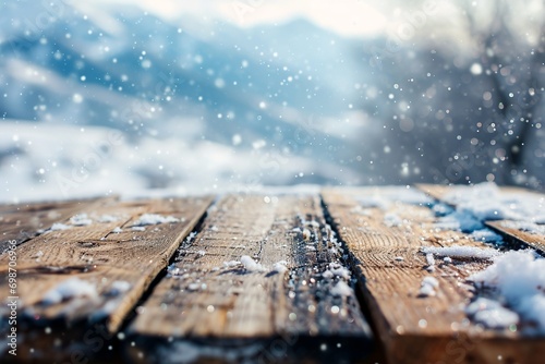 Winter Wonderland Desk: Snow-Covered Wooden Surface with Blurred Mountain Landscape