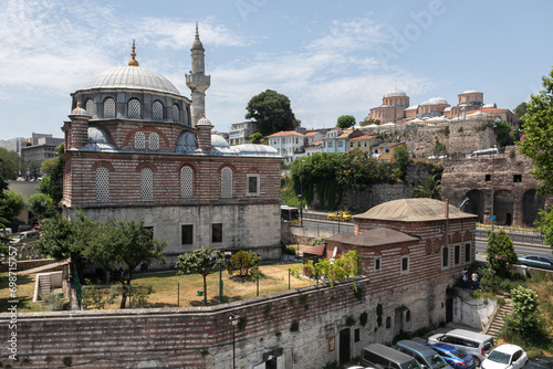 Sebsefa Hatun Cami is a large red brick Mosque. Turkish religious building is on Fatih district in Istanbul close to Golden Horn bay. photo