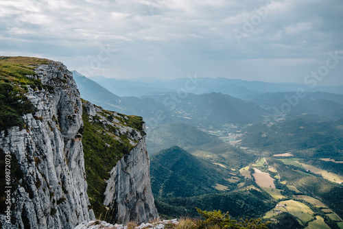 View of the alpine meadows of the Font d'Urle plateau in the Vercors (Drôme, France) with its cliffs, limestone rocks, and pastures