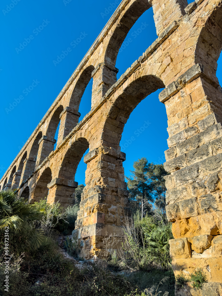 Roman aqueduct Devils Bridge at Sunset. Tarragona, Catalonia, Spain. High quality photography
