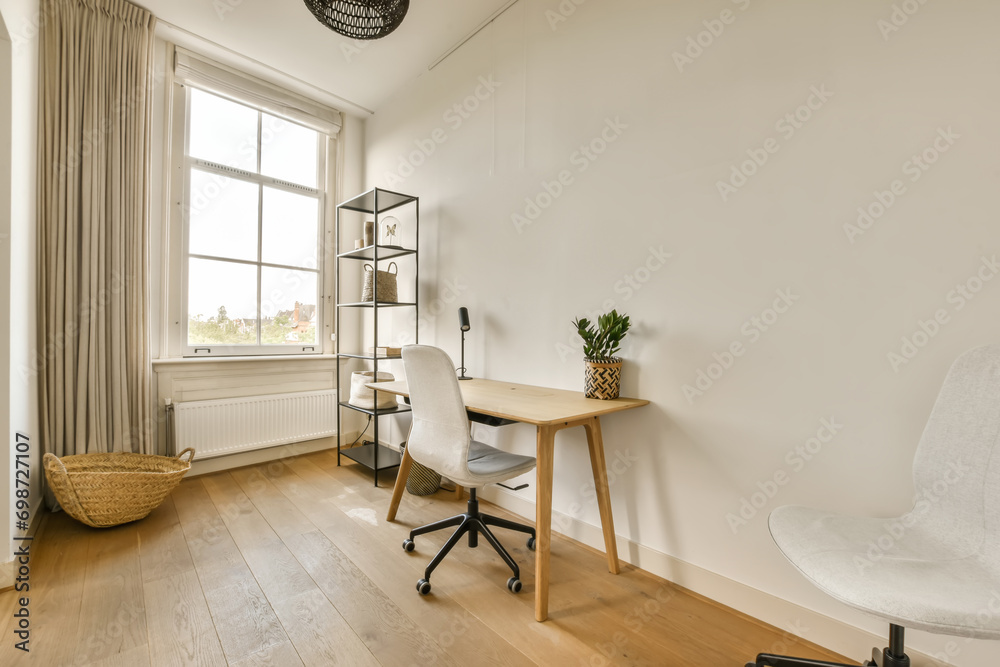 Home office with desk and window Home office with desk and window