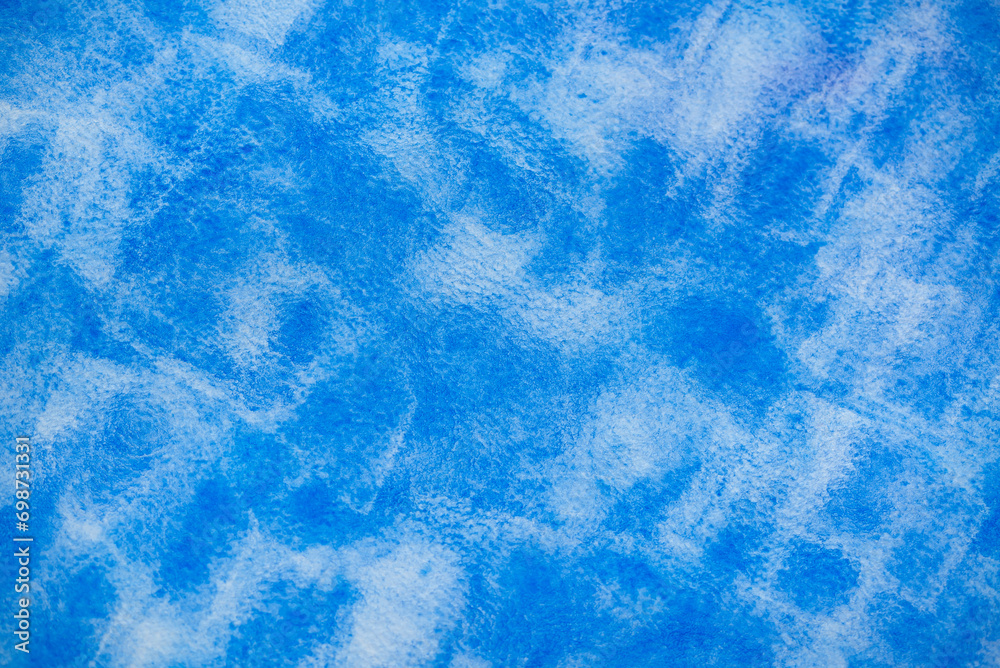 Abstrakter blauer Hintergrund mit Aquarellfarbe und Textur