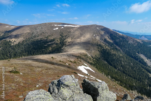 Panoramic view of mountain peak of Amerinkogel on Packalpe, Lavanttal Alps in Styria, Austria. Remote alpine hill landscape in Austrian Alps. Wanderlust. Tranquil serene scene on alpine meadows photo