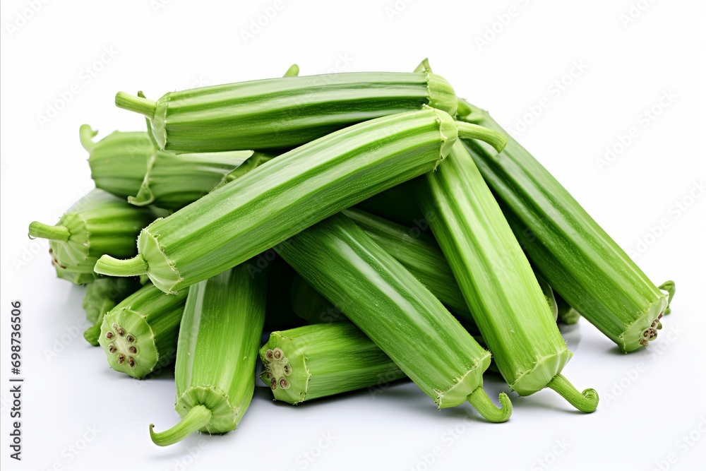 Fresh okra on white backdrop visually captivating element for ads packaging designs Fresh okra on white backdrop visually captivating element for ads packaging designs