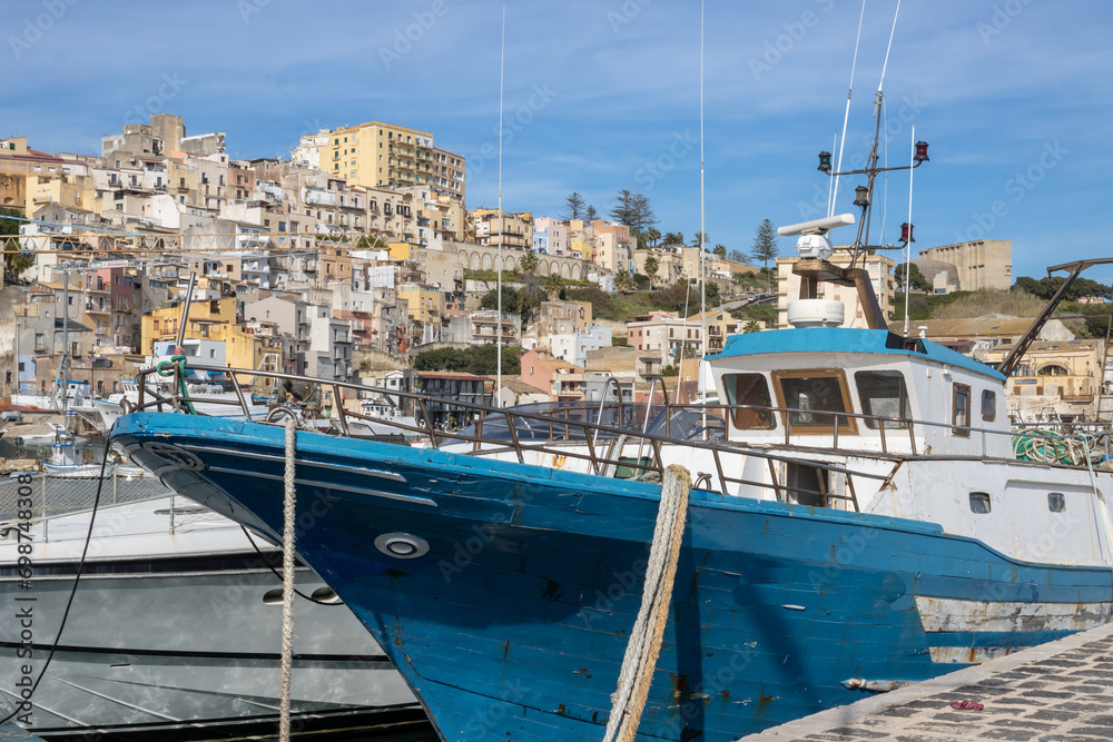 Harbor with fishing boats and city Sciacca, Sicily