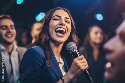 Employees enjoying karaoke or lip-sync battle moments at the office party