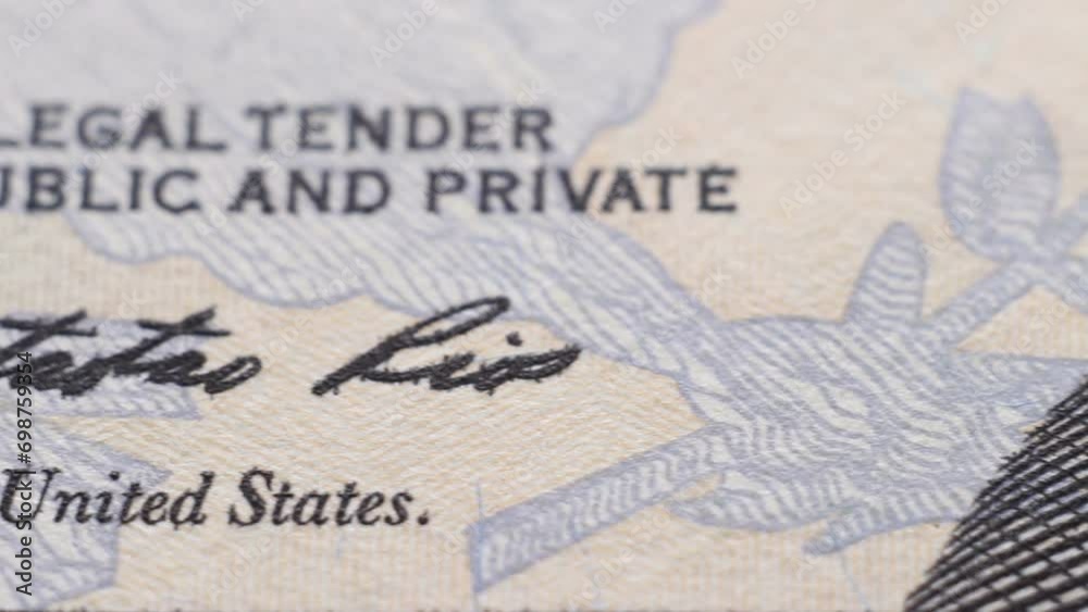 Tracking macro elements on the US dollar bill. US dollars background.