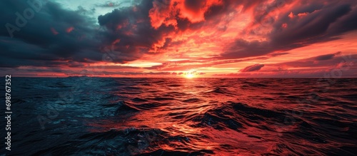 Scarlet dusk above the sea. photo