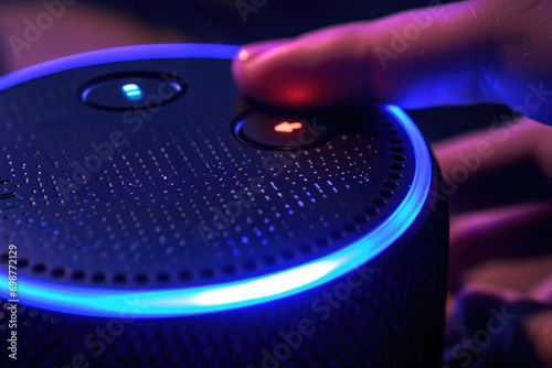 A detailed close-up of a person's finger resting on a speaker. This image can be used to illustrate music, sound, technology, or audio-related concepts